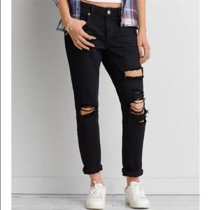 Discolored women’s black ripped jeans